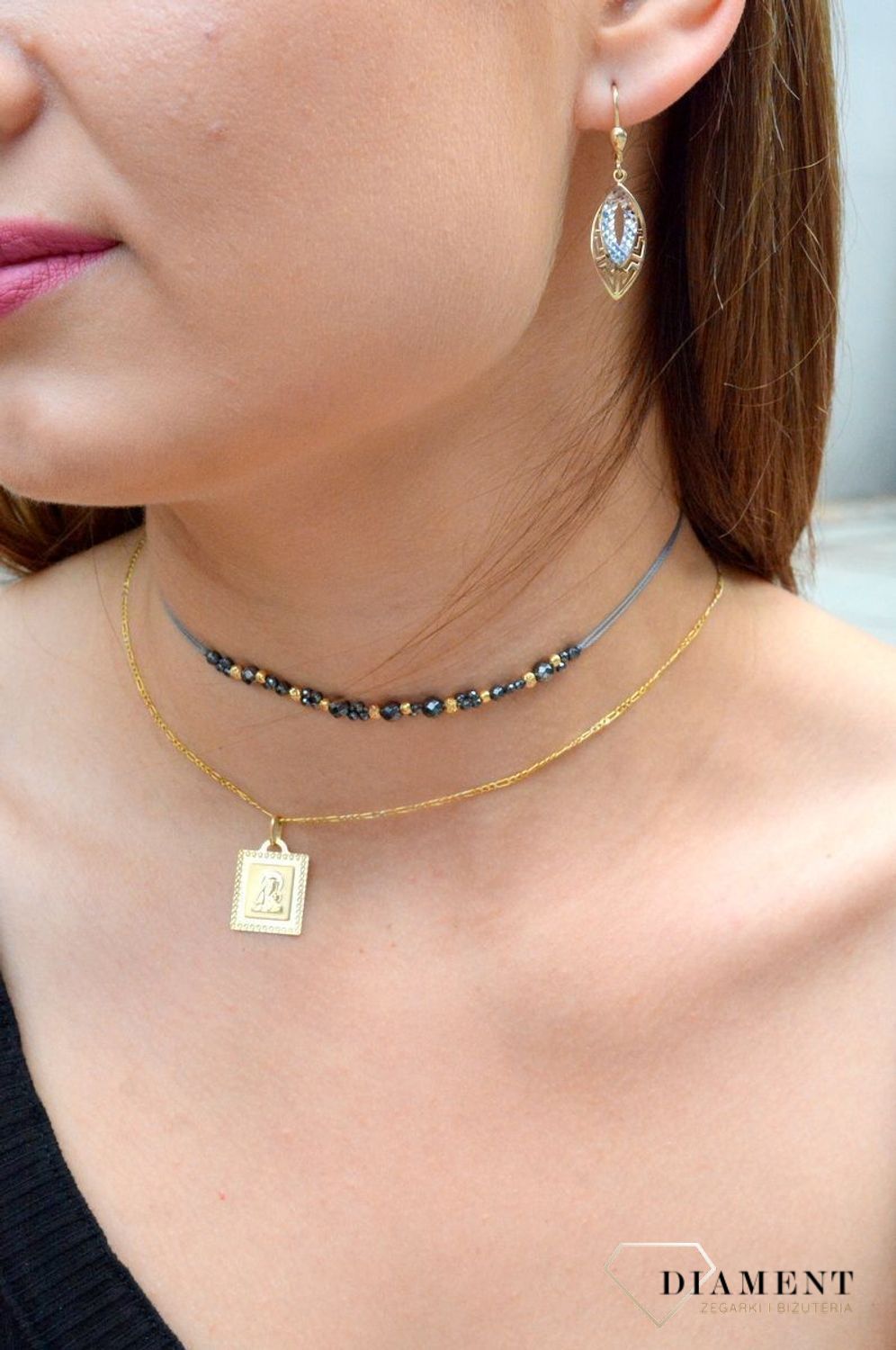 Kolczyki złote pr 333 długie ażurowe z białym złotem KL 5751 333. Od minimalistycznych zdobień po intensywne i nowoczesne formy. Olśniewające kolczyki wykonane z wysokiej jakości 8-karatowego żółtego złota i białego złota, pró.jpg